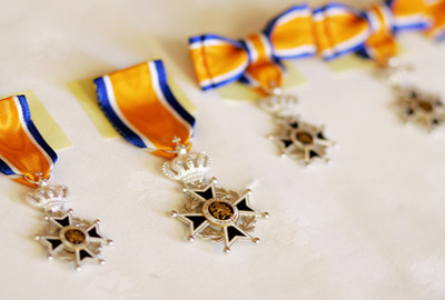 Vier KHN-leden koninklijk onderscheiden