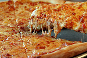 Trostomaatjes op eigen pizza koningin Beatrix