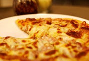 Kwalitaria overweegt verkoop pizza's