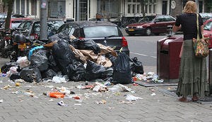 Imagoschade Amsterdam door afvalbergen