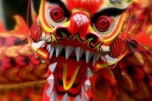 Viering Chinees Nieuwjaar met vuurwerk op dak Krasnapolsky