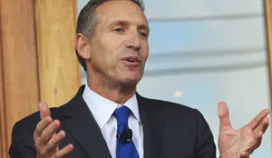 Starbucks chairman, president and ceo, Howard Schultz, addresses partners (employees) and community leaders during the companyÕs 40th anniversary celebration at Starbucks Headquarters in Seattle on March 8, 2011.nnThe Seattle Headquarters joins four stores worldwide (Beijing, London, Paris, New York) as the first to unveil new logos. REUTER/Anthony Bolante/Handout (UNITED STATES Slug: Starbucks/)