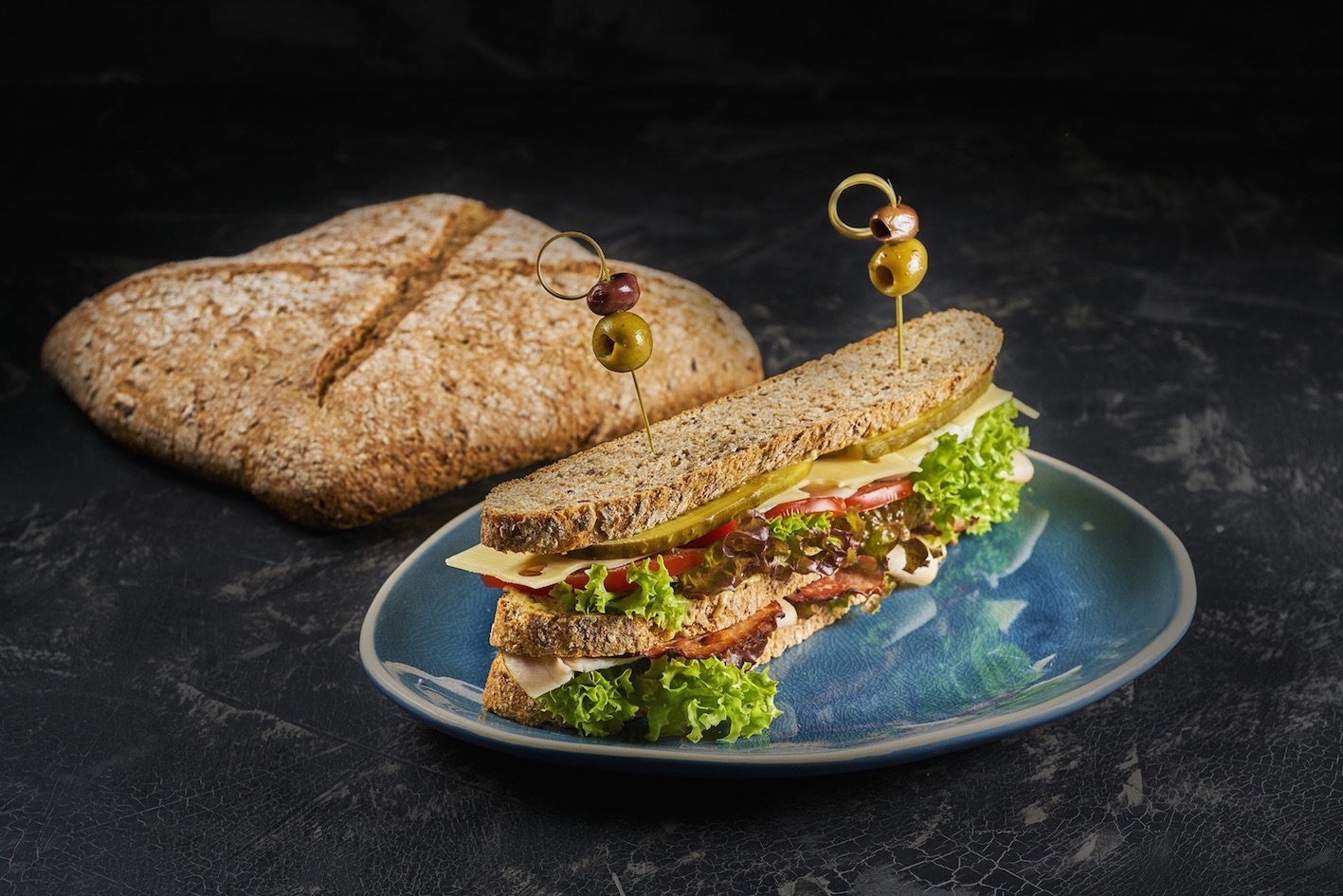 De Oldenheimer is een biologisch zuurdesembrood van 100 procent volkoren tarwe met toevoeging van lijnzaad, zonnebloempitten en havervlokken.