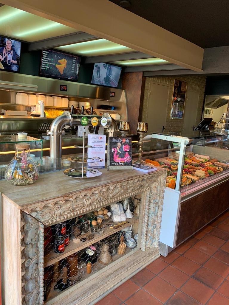 Het vernieuwde interieur van Snackpoint Munstergeleen. Foto's: Snackpoint