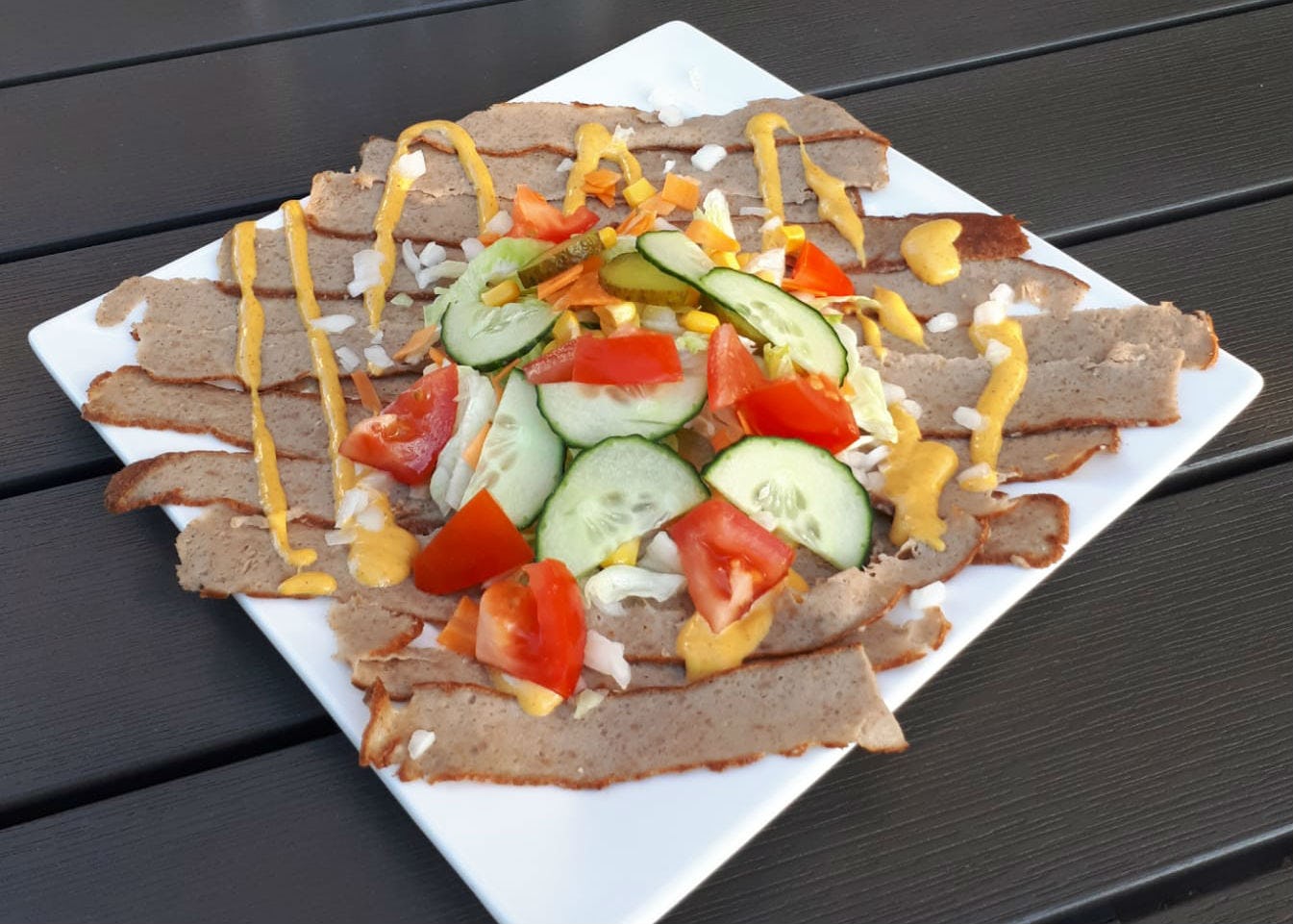 Frikandellencarpaccio 't Huus voorbode van nieuwe kaart