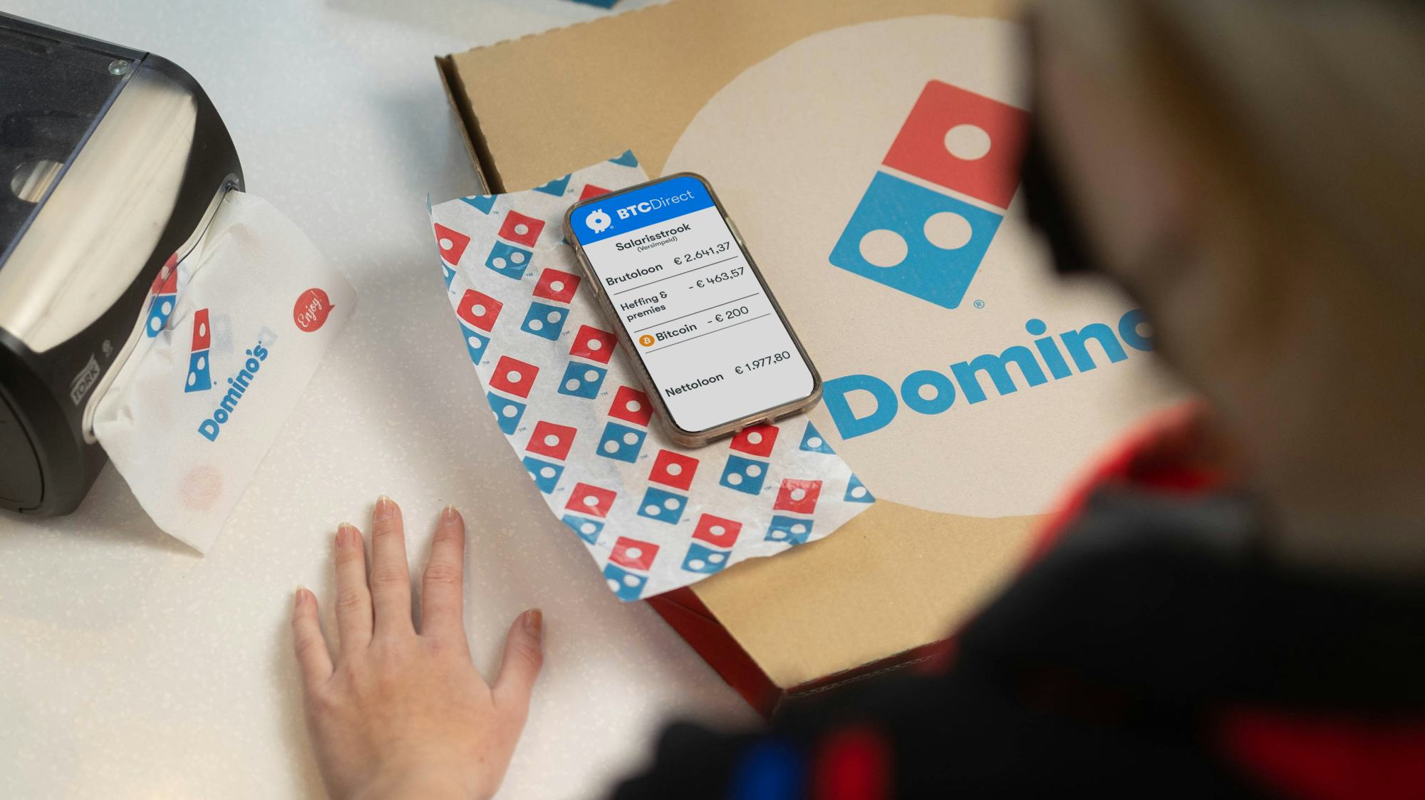 Franchisenemer Domino's Pizza biedt medewerkers bitcoin-salaris 