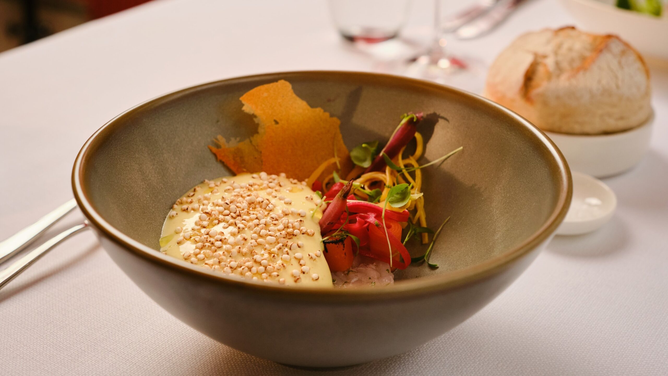 Langoustine, curry, wortel, quinoa.