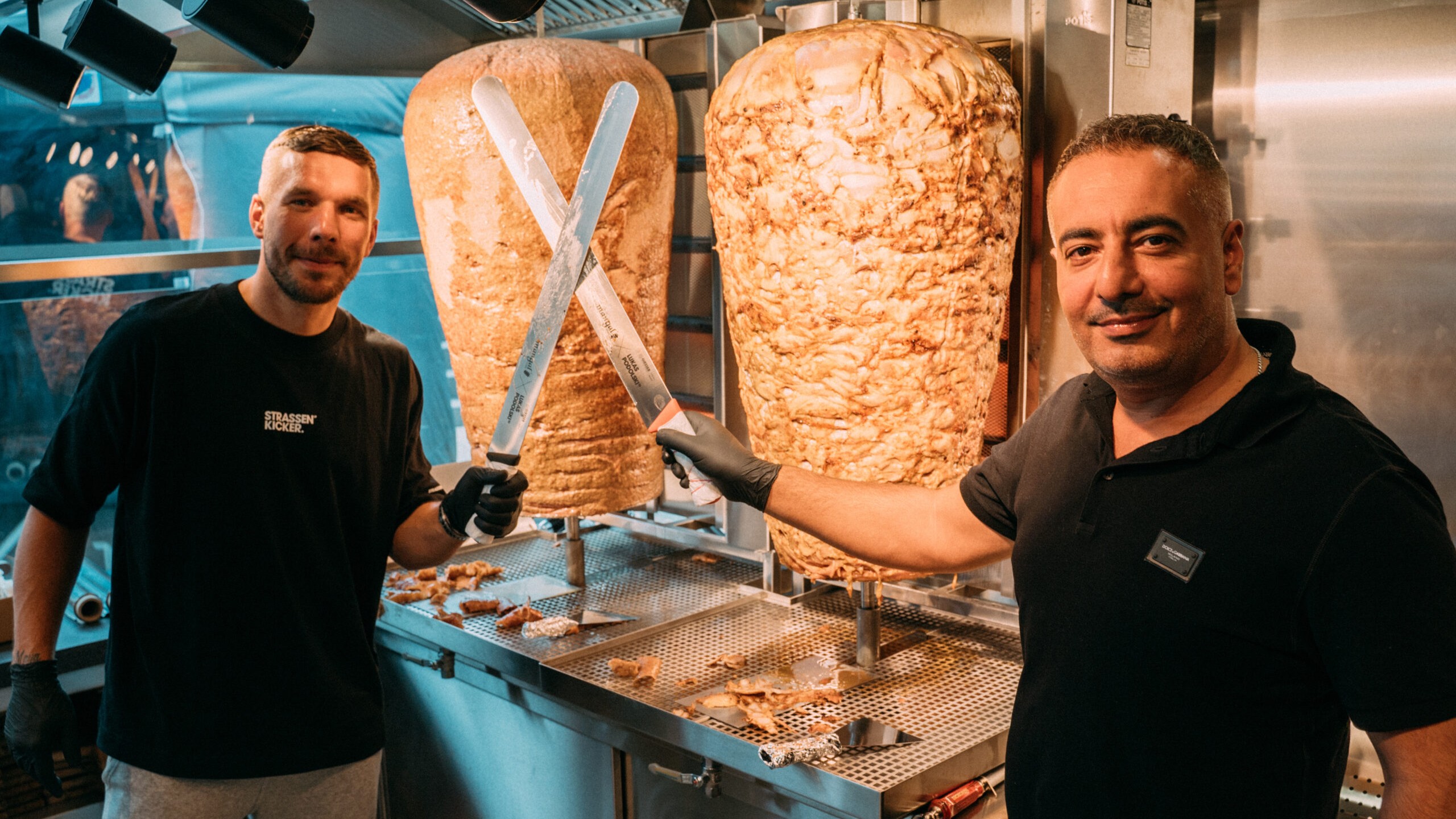 Lukas Podolski en Bahadir Tasören.